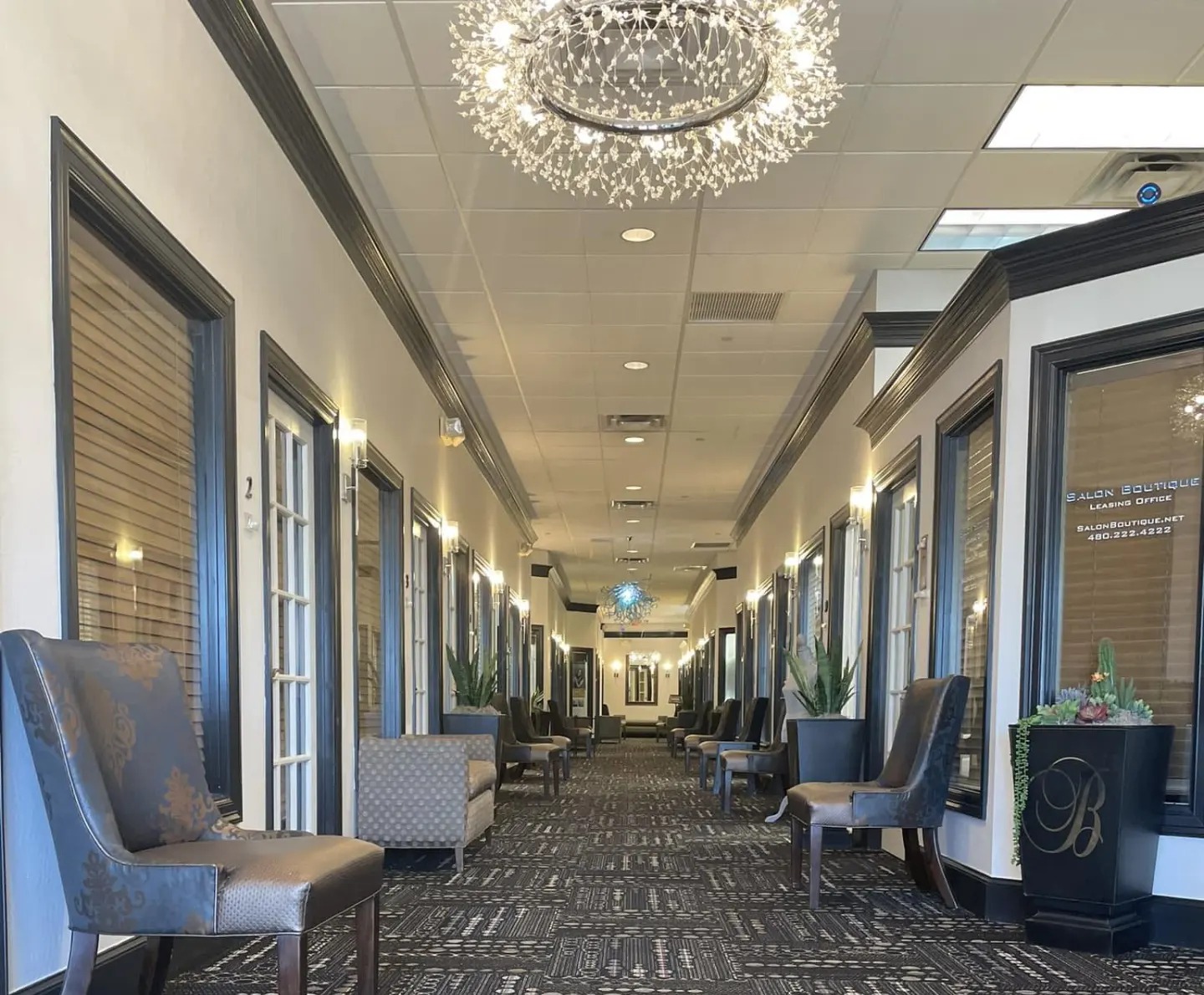 Interior hallway of Salon Boutique leading to the private Artistic Hair Extensions studio suite #44